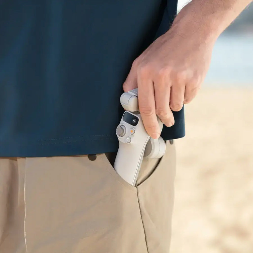 DJI Osmo Mobile 7 – 3-Axis Gimbal Stabilizer with Intelligent Tracking, Built-In Tripod, AI Editing, and 10-Hour Battery Life