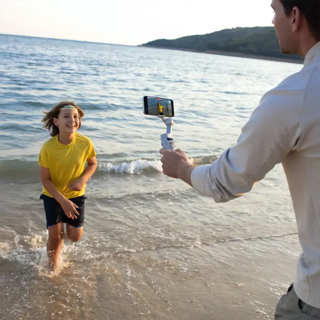 DJI Osmo Mobile 7 – 3-Axis Gimbal Stabilizer with Intelligent Tracking, Built-In Tripod, AI Editing, and 10-Hour Battery Life