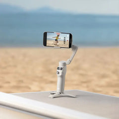 DJI Osmo Mobile 7 – 3-Axis Gimbal Stabilizer with Intelligent Tracking, Built-In Tripod, AI Editing, and 10-Hour Battery Life