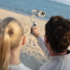 DJI Osmo Mobile 7 – 3-Axis Gimbal Stabilizer with Intelligent Tracking, Built-In Tripod, AI Editing, and 10-Hour Battery Life